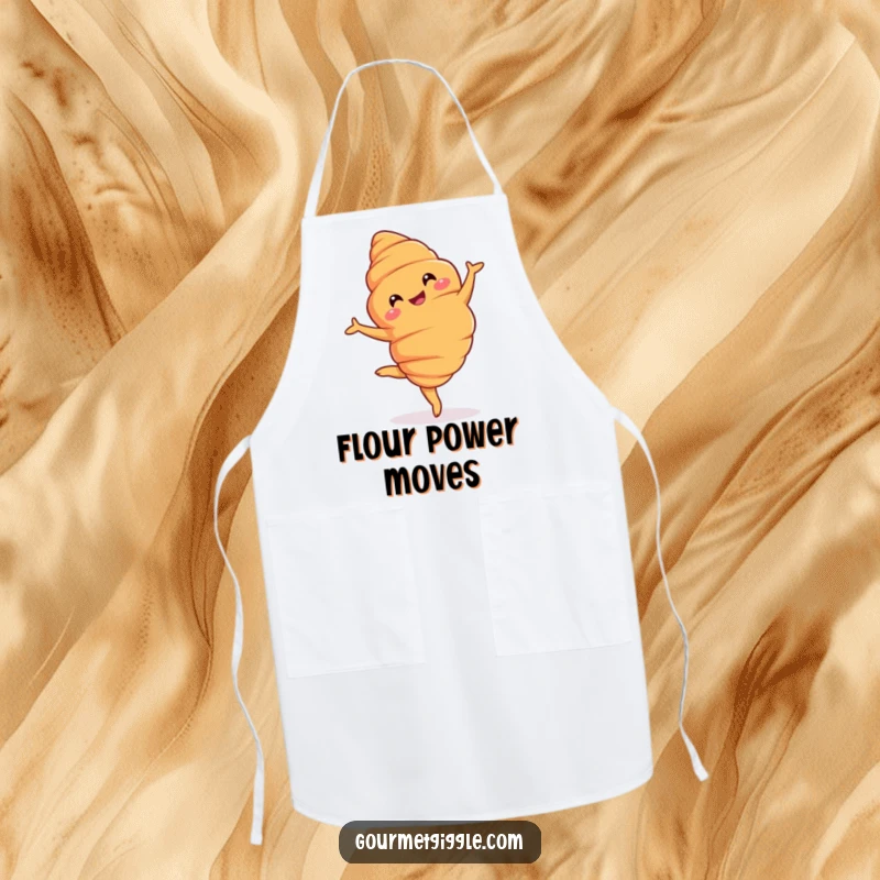 Funny Apron: A grinning croissant performing a graceful pirouette, ideal for baking with a touch of Parisian elegance.