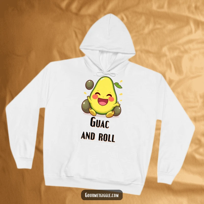 Funny Hoodie depicting a smiling avocado masterfully juggling its pits, embodying fun and healthy living.