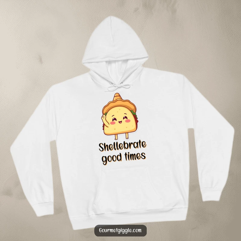 Funny Taco Sombrero Hoodie displaying a happy taco wearing a sombrero and tapping its shell, radiating warmth and hilarity.